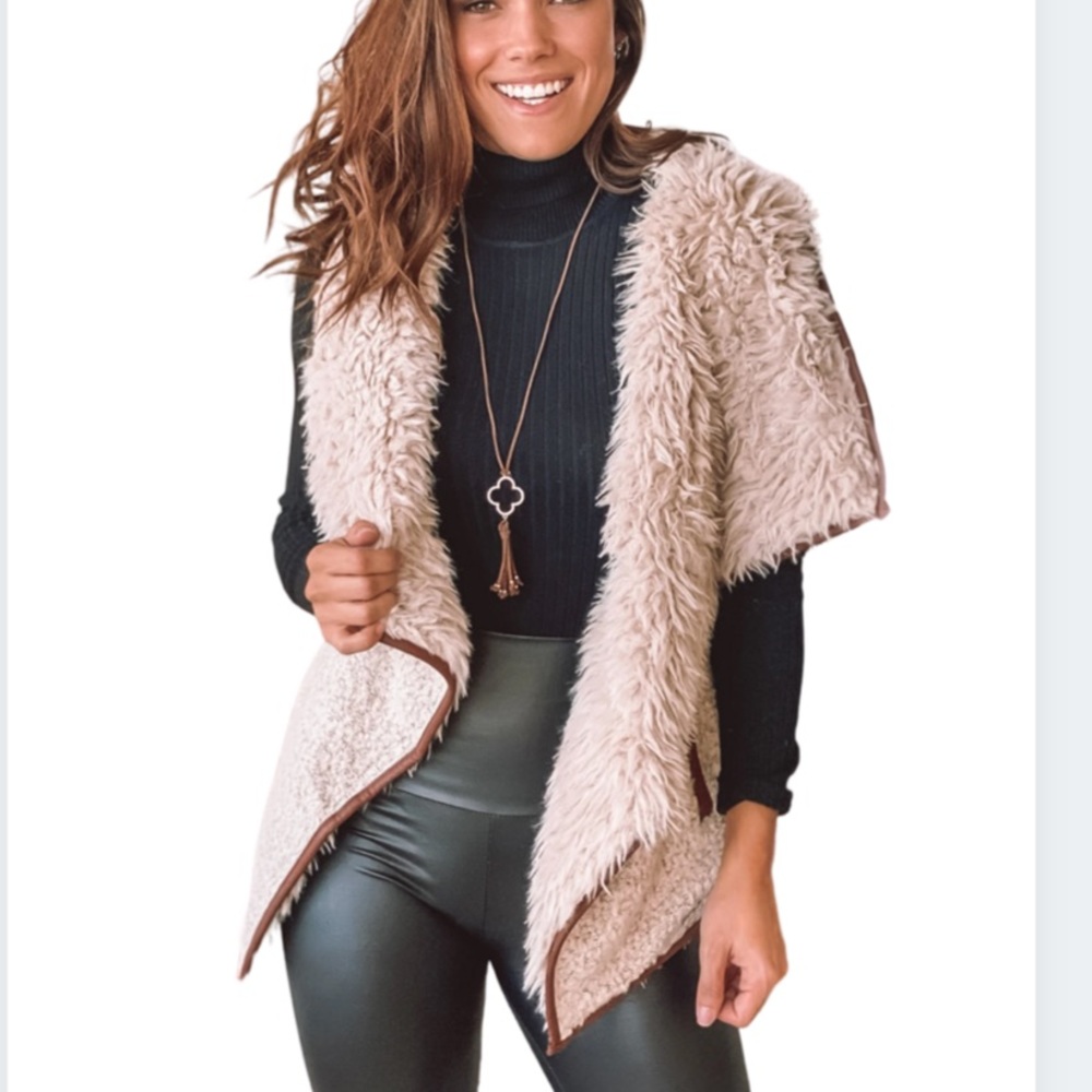Faux fur vest with pockets!
